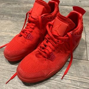 Red Nike Jordan Retro IV flyknit shoes
